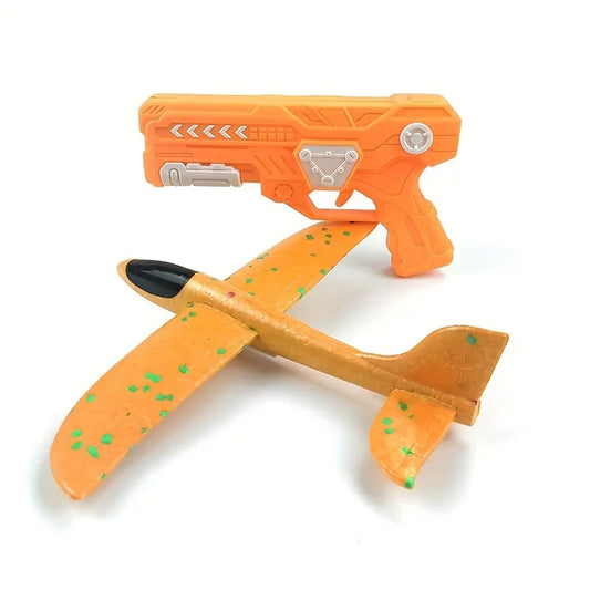 Outdoor Foam Airplane Launching Set: Green Launcher & Orange Handheld Glider for Kids' Active Play