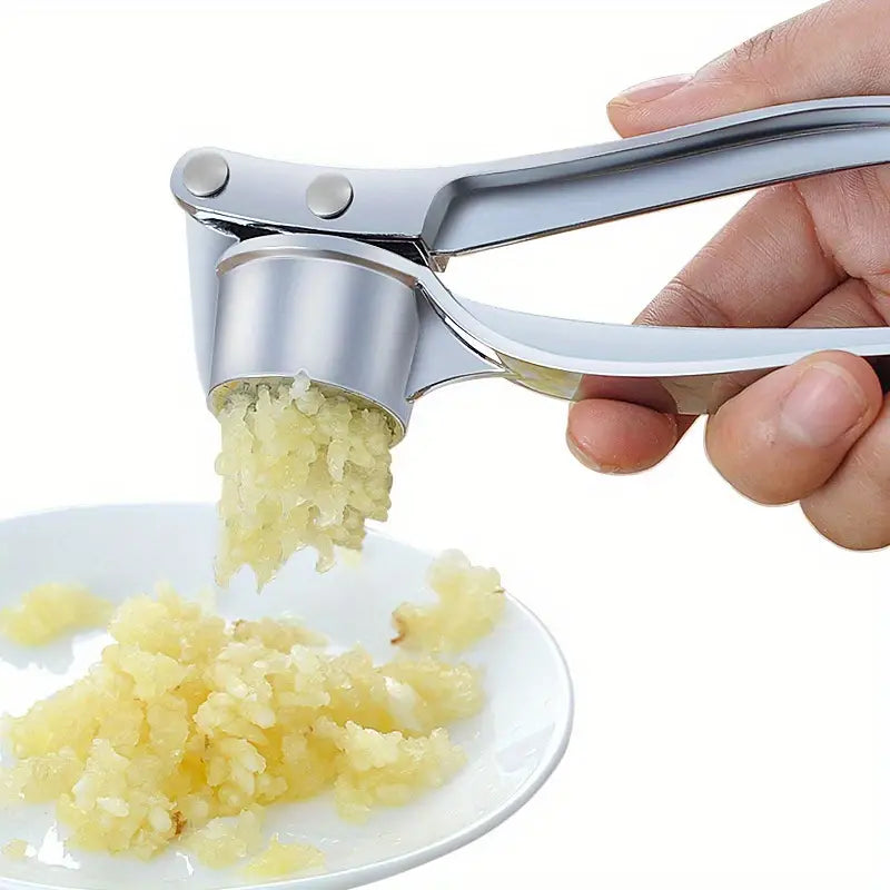 "Stainless Steel Garlic Press: Durable Manual Mincer & Ginger Crusher for Easy Cooking"