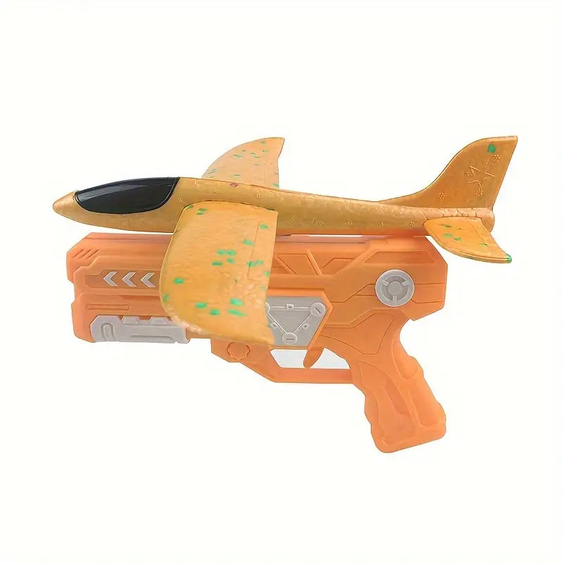 Outdoor Foam Airplane Launching Set: Green Launcher & Orange Handheld Glider for Kids' Active Play